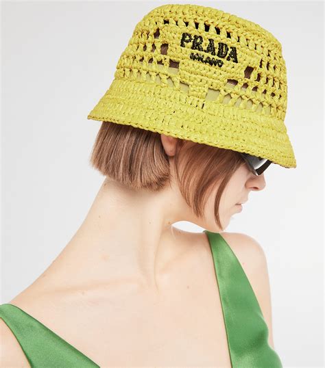 yellow prada hat|Prada raffia bucket hat.